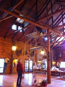 Cleaning each log of the Lodge--50 feet high at the apex.