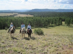 Long time guests on a backcountry ride at Rainbow Trout Ranch